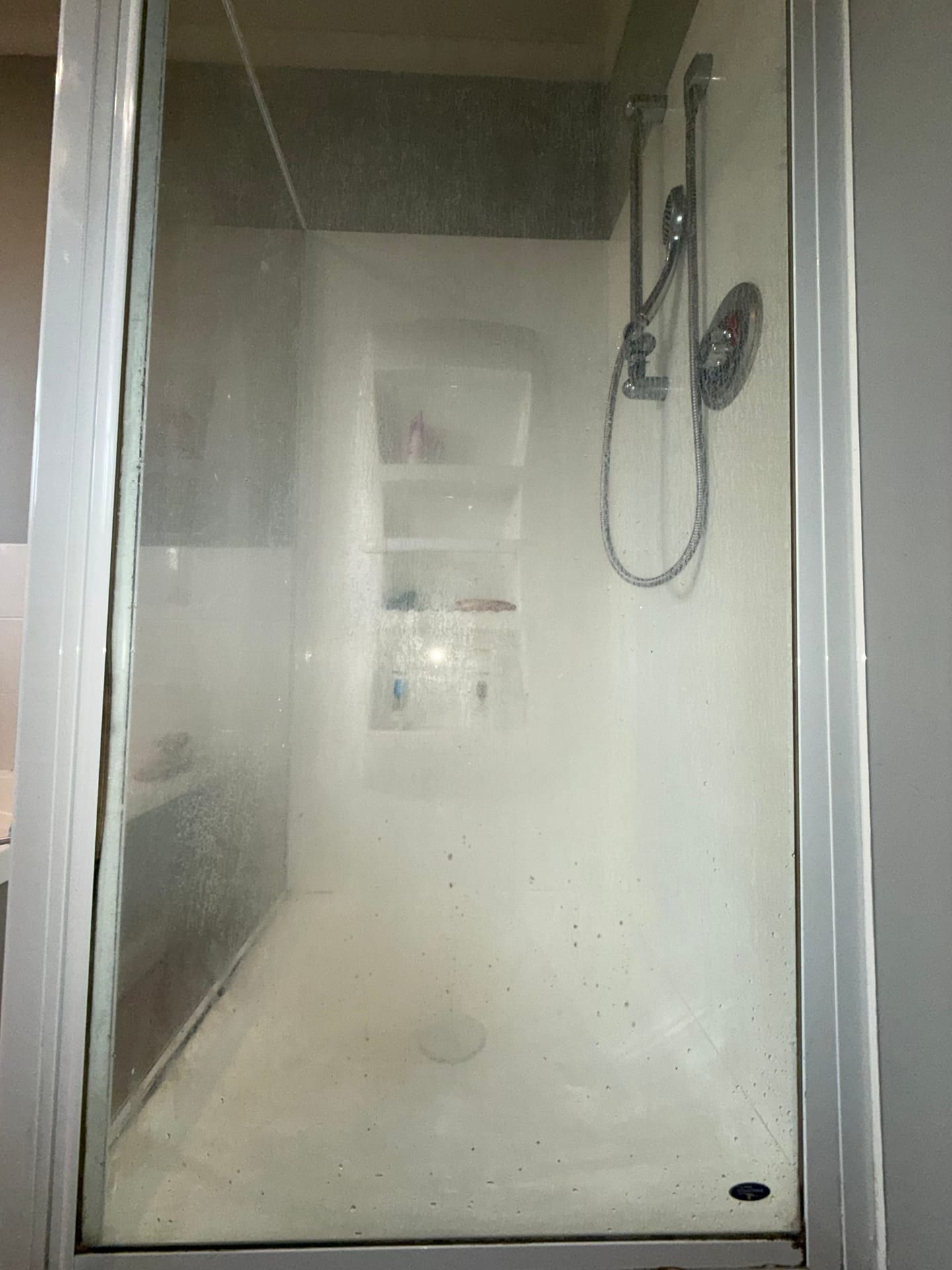 Shower glass clean — before cleaning